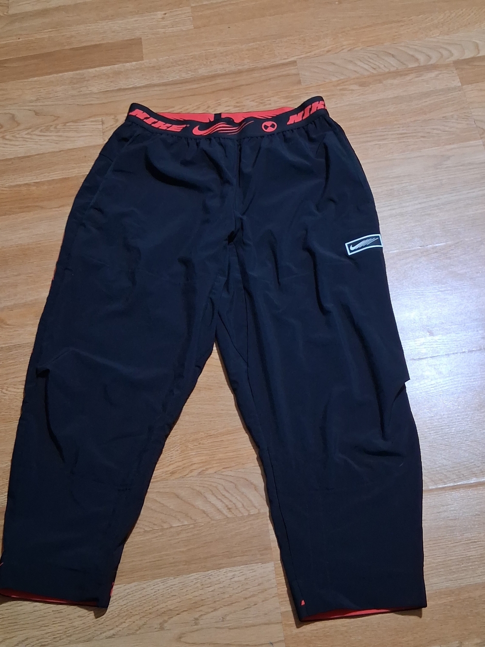 Nike Men's Black Athletic Pants with Red Waistband